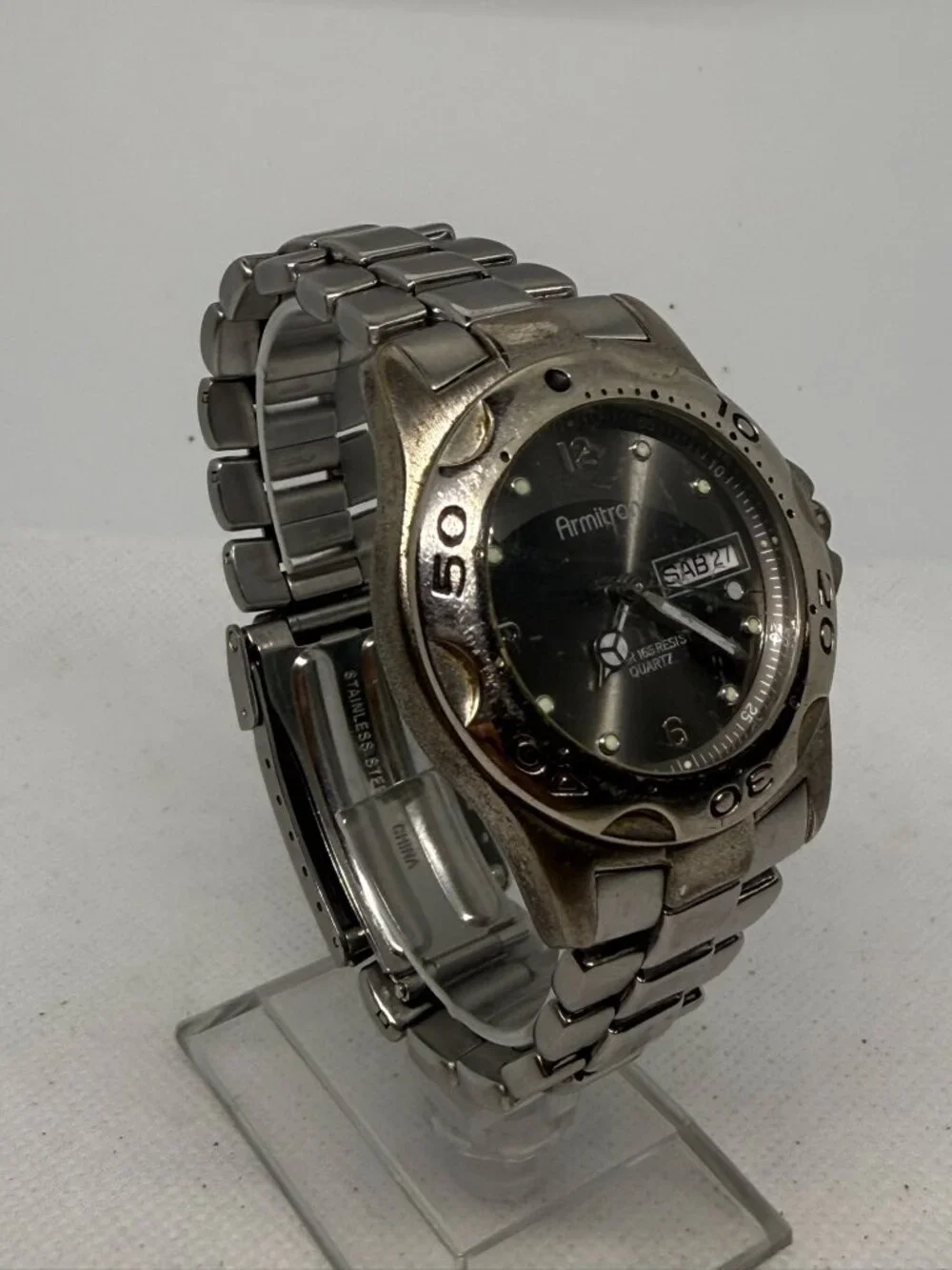 Armitron Men's SS Rotating Bezel Dark Grey Dial Day Date Bracelet Quartz Watch